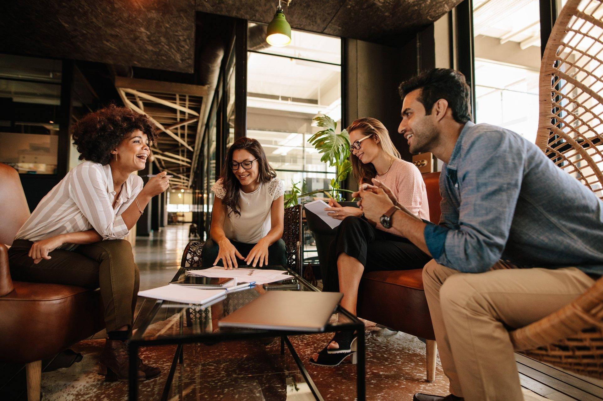 coworkers having a modern workplace meeting