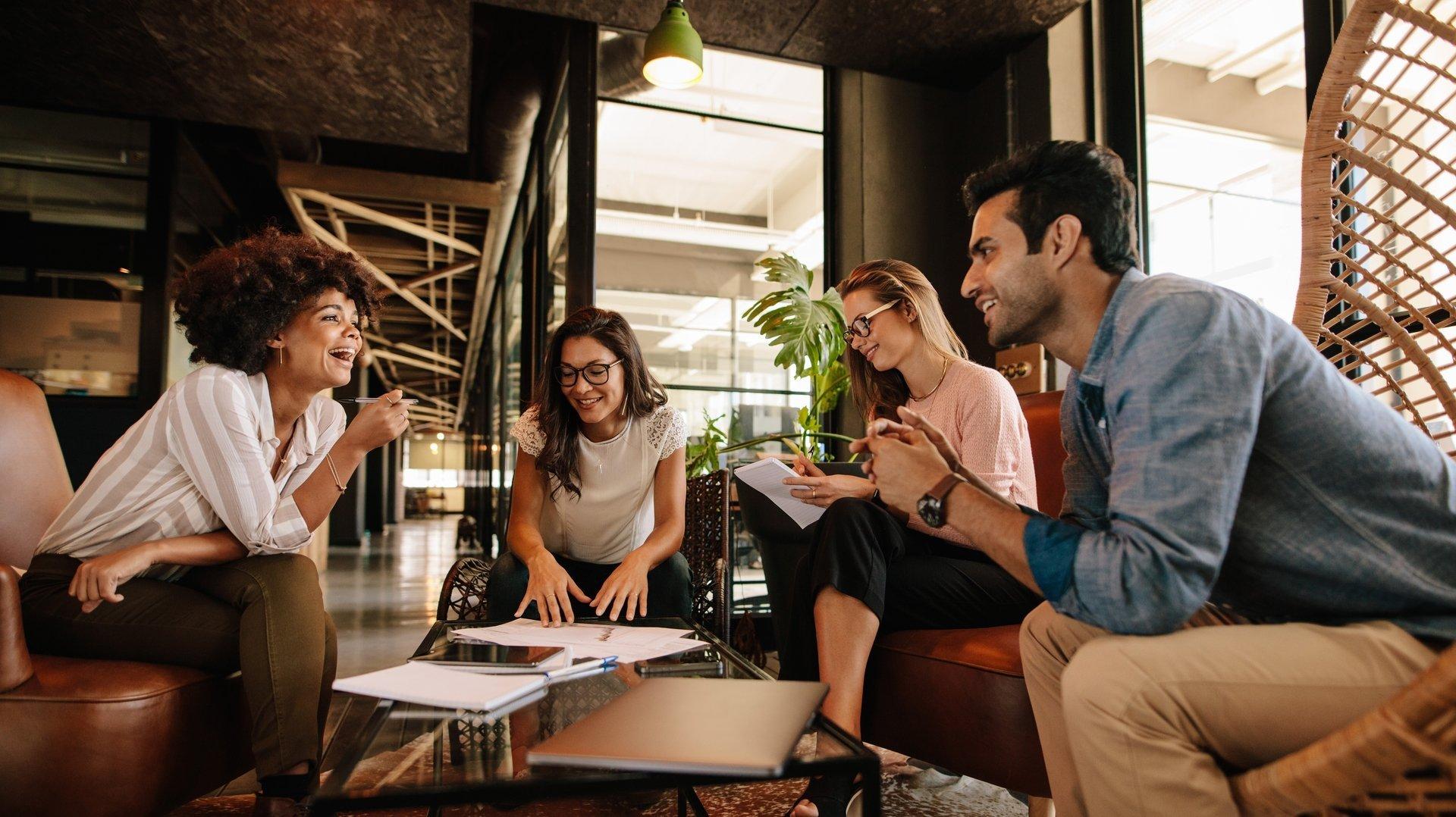 coworkers having a modern workplace meeting