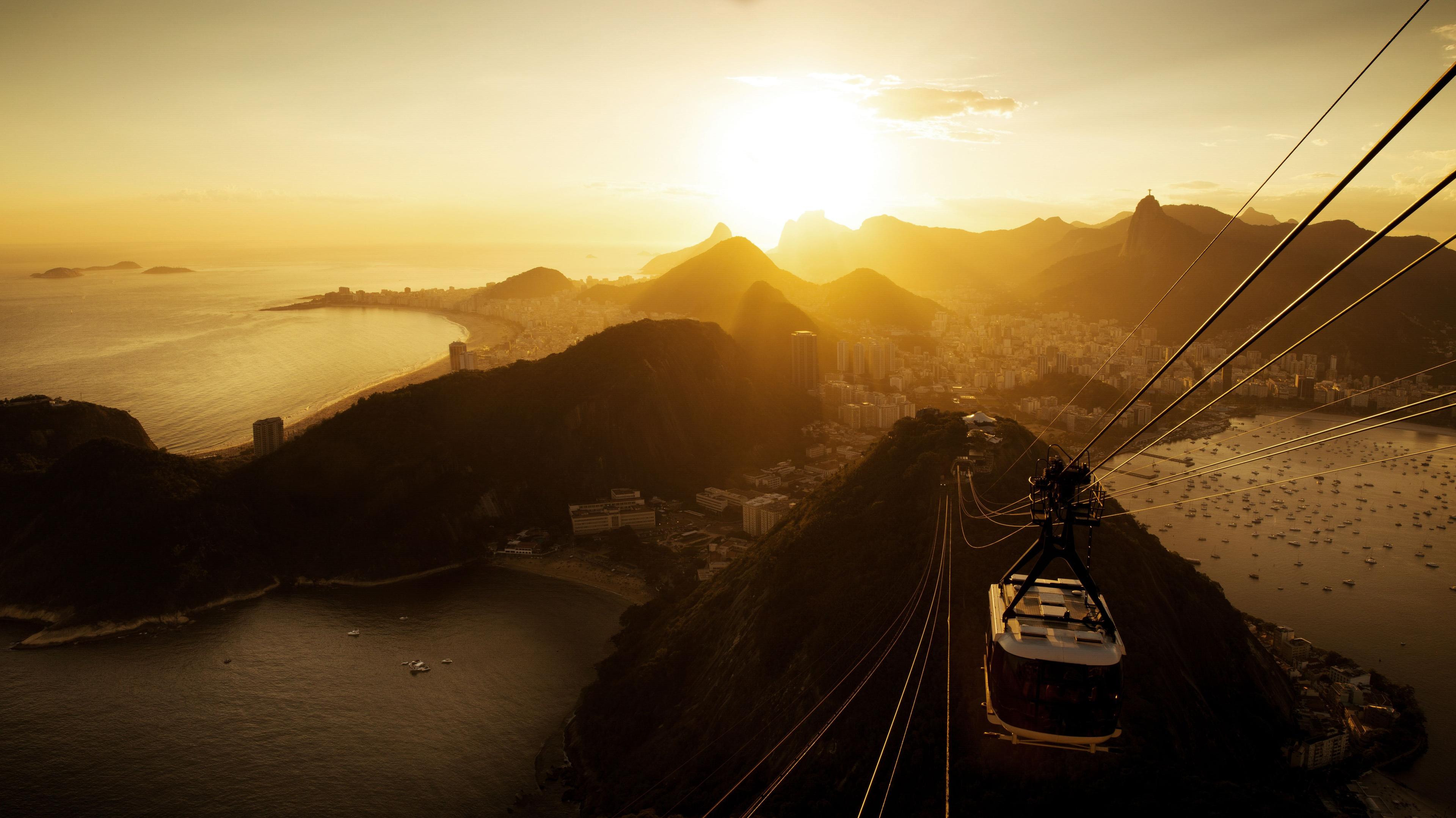 aerial cablecar traveling in sunset
