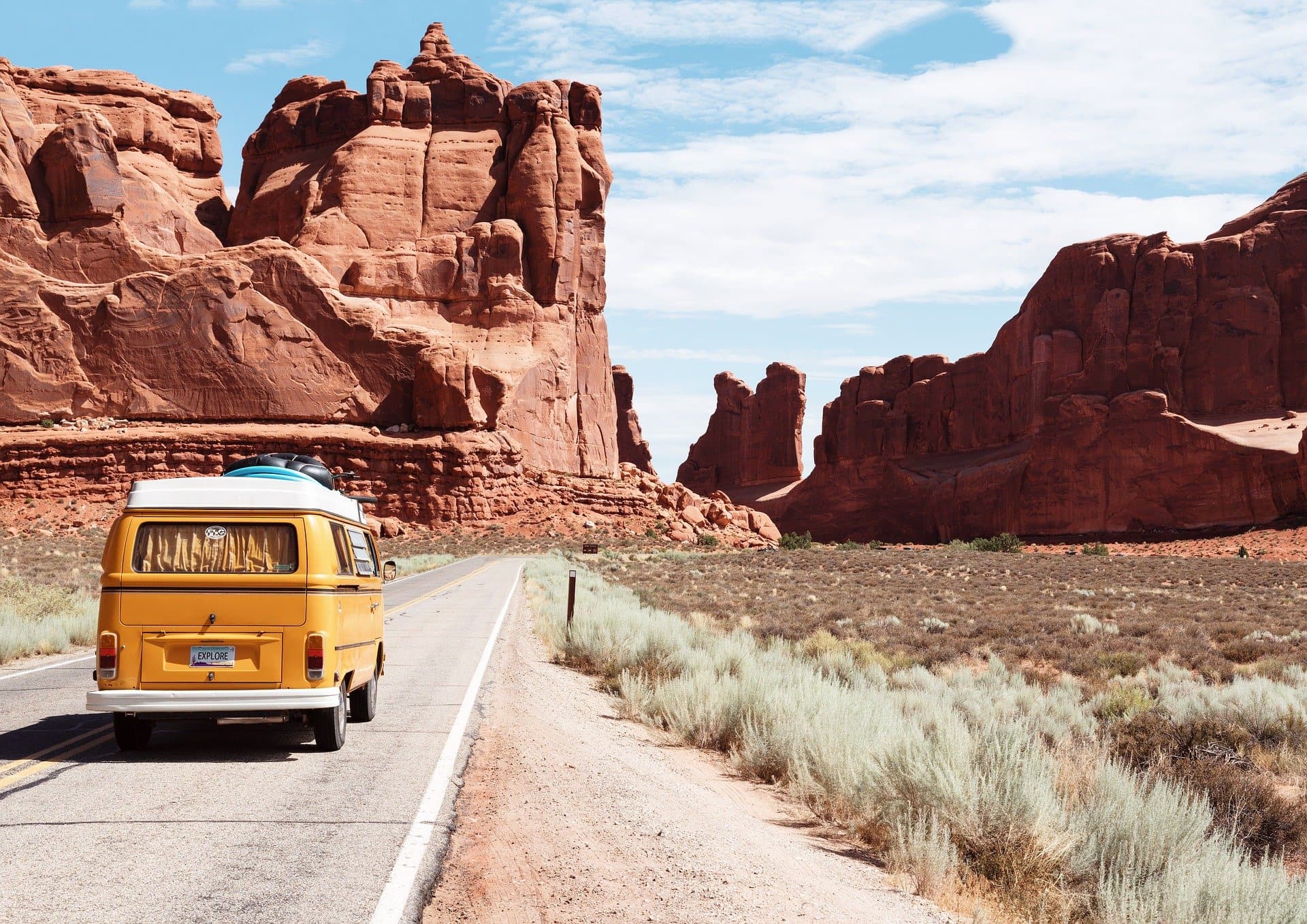 yellow van driving to Arches National Park